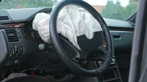 Damaged Car Interior with Deployed Airbag after Road Crash Accident  Stock Footage 320423456