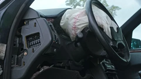 Damaged Car Interior with Deployed Airbag after Road Crash Accident  Stock Footage 320424414