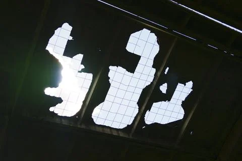 Damaged ceiling with exposed sky Foto stock