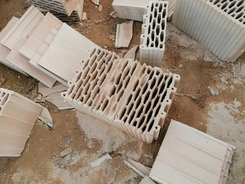 Damaged ceramic block during construction process Stock Photos