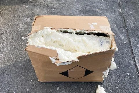 Damaged container with polyurethane foam, damaged box with polyurethane foam Stock Photos