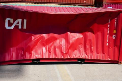 Damaged container (red) Foto stock