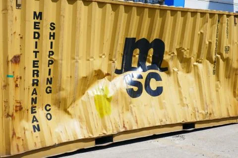 Damaged container (yellow) Foto stock