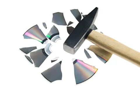 Damaged data Broken compact disk with a hammer isolated over white Copyrig... Foto stock