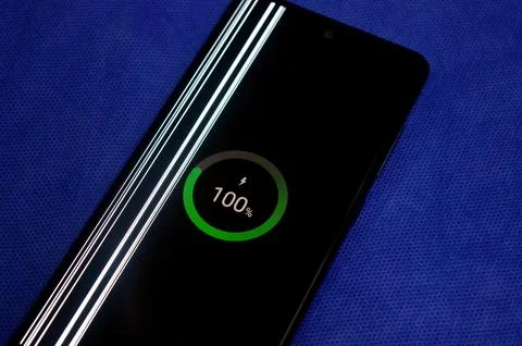 A damaged display of a smartphone, with a vertical lines on the screen, thi.. 스톡 사진