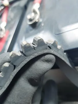 Damaged Engine Belt Close-Up Foto stock