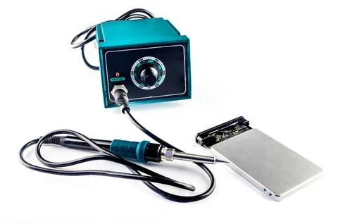 Damaged external drive SSD HDD , transformer soldering iron on white backgr.. Stock Photos