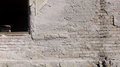 Damaged facade brick wall plaster Stock Footage 112980177