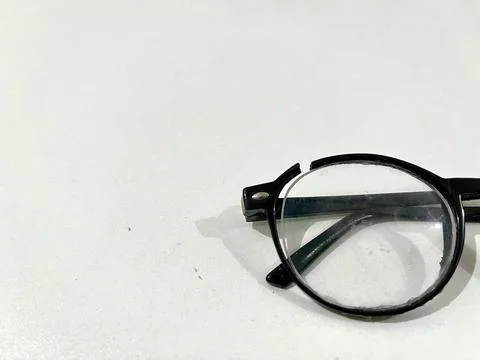 Damaged glasses frame on white background Stock Photos