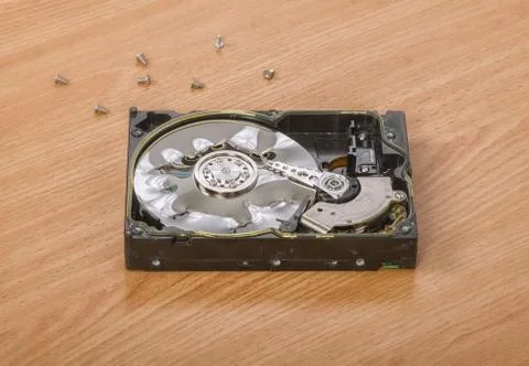 Damaged hard drive is on the table Фото