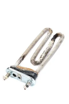Damaged heating element of the washing machine. Stock Photos