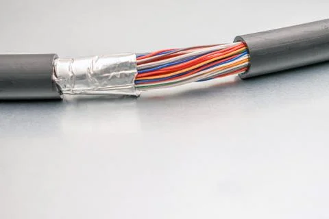 Damaged Isolation of Backbone channel. Multicolored trunk cable is torn off.  Stock Photos