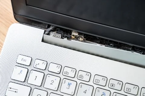 Damaged Laptop Computer With Broken Screen Attachment Stock Photos