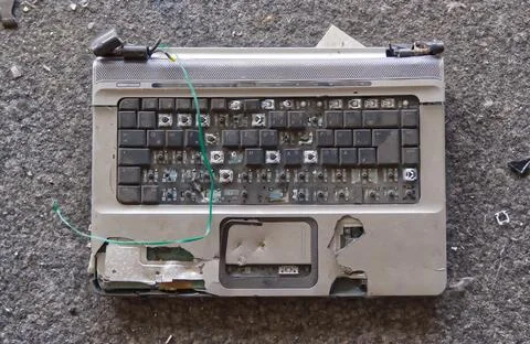 Damaged Laptop Keyboard with Exposed Components Stock Photos
