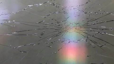 Damaged LCD screen with cracks, full-frame background Stock Photos