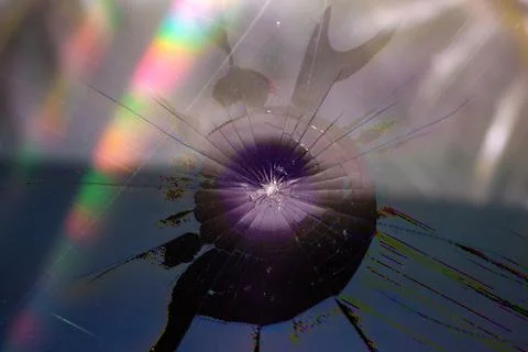 Damaged LCD screen with cracks, full-frame background 스톡 사진