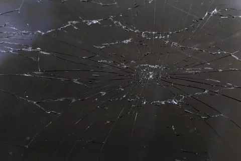 Damaged LCD screen with cracks, full-frame background Photos
