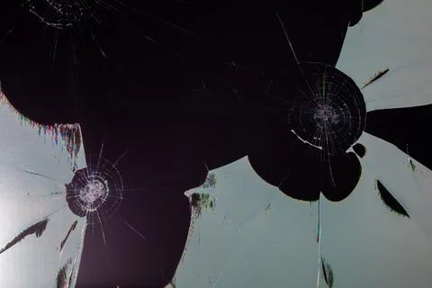Damaged LCD screen with cracks, full-frame background and texture Stock Photos