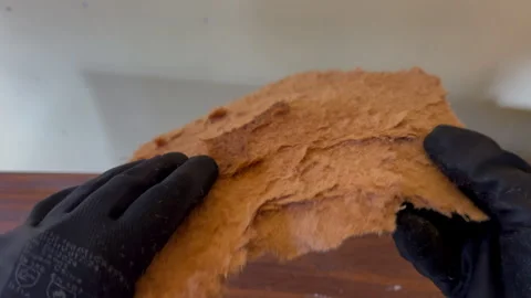 Damaged MDF Panel Removed and Torn to Reveal Moisture Weakness in 4K60 Stockbeeldmateriaal 332681959