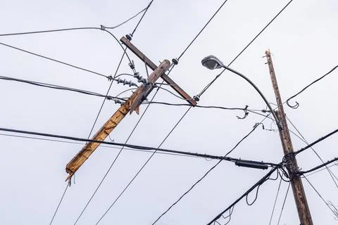 Damaged overhead power lines after storm Stock Photos