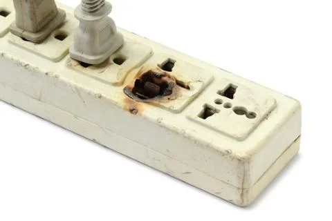 Damaged power strip Stock Photos