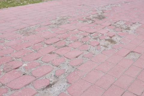 Damaged Red Brick Walkway Needs Immediate Repair Stock Photos