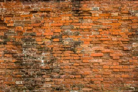 Damaged red brick wall texture Stock Photos