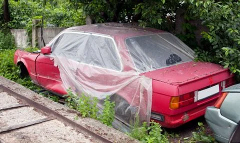 Damaged red car Stock Photos