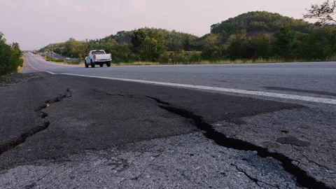 Damaged road shoulder is cracked Stock Footage 276677369