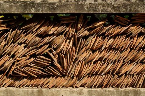 Damaged roof tile stack background Stock Photos