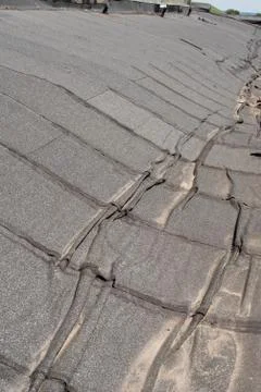 Damaged  roofing felt Foto stock
