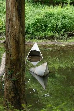 Damaged Sunken Canoe Stock Photos