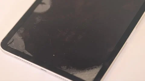 Damaged tablet screen protector peeling off 動画素材 335250695