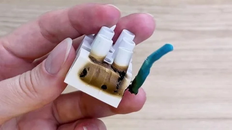 A damaged terminal block opens contact after overheating. Stock Footage 336609341