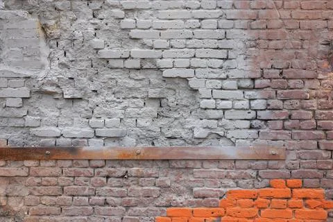 Damaged texture of a brick wall Foto stock