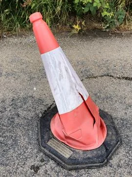 Damaged traffic cone Stock Photos
