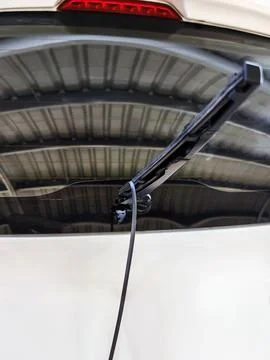 Damaged windshield wiper. Deteriorated windshield wiper blade rubber. Damag.. Stock Photos