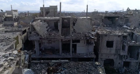 Damascus suburb destroyed in aerial view, Syria Stock Footage