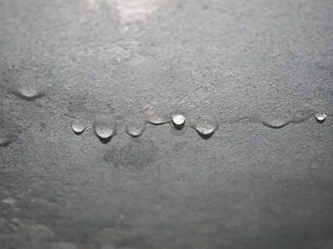 Dampness moisture on ceiling with drops of water infiltration Stock Photos