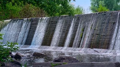 Dam.Power stream of clean water.Waterfall,spa,pool Stock Photos