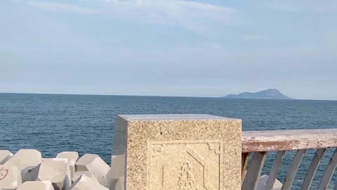 Dams to withstand the impact of waves and corridors built along the coastline Stock Footage 157101211