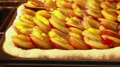 A damson cake in an oven (time lapse) Stock Footage 24672123
