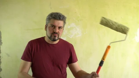 Dance against the wall. In the hands of a roller 4K Stock Footage 126145534