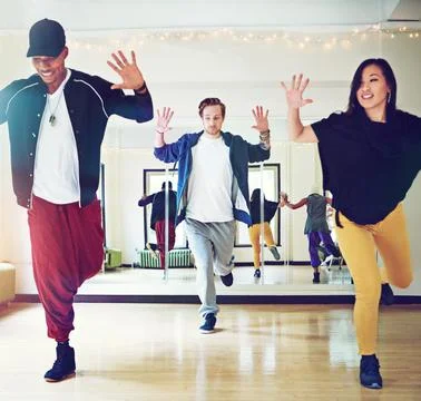 Dance class - where technique and passion meet. a group of young people dancing Foto stock