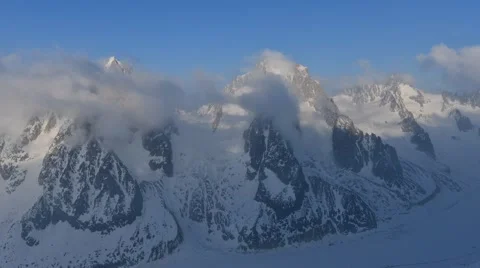 Dance of Clouds / Timelapse over Mountains in Alps Stock Footage 61819719