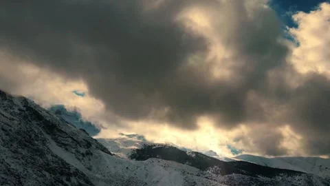 The dance of clouds on a winter day time lapse Stock Footage 331359560