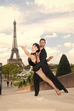 Dance couple in front of eifel tower in paris, france. beatuiful ballroom dance Stock Photos