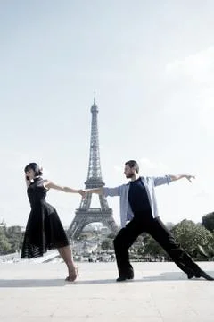 Dance couple in front of eifel tower in paris, france. beatuiful ballroom dance Stock Photos