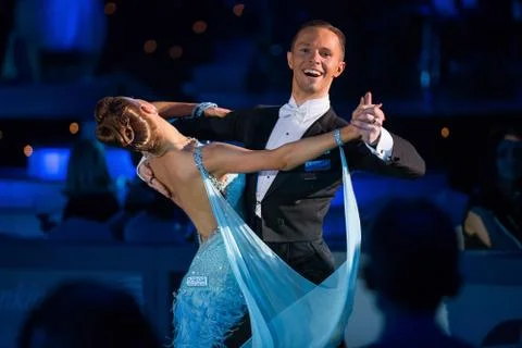Dance couple performs at the ballroom dance event Stock Photos