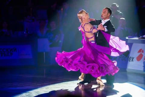 Dance couple performs at the ballroom dance event Stock Photos